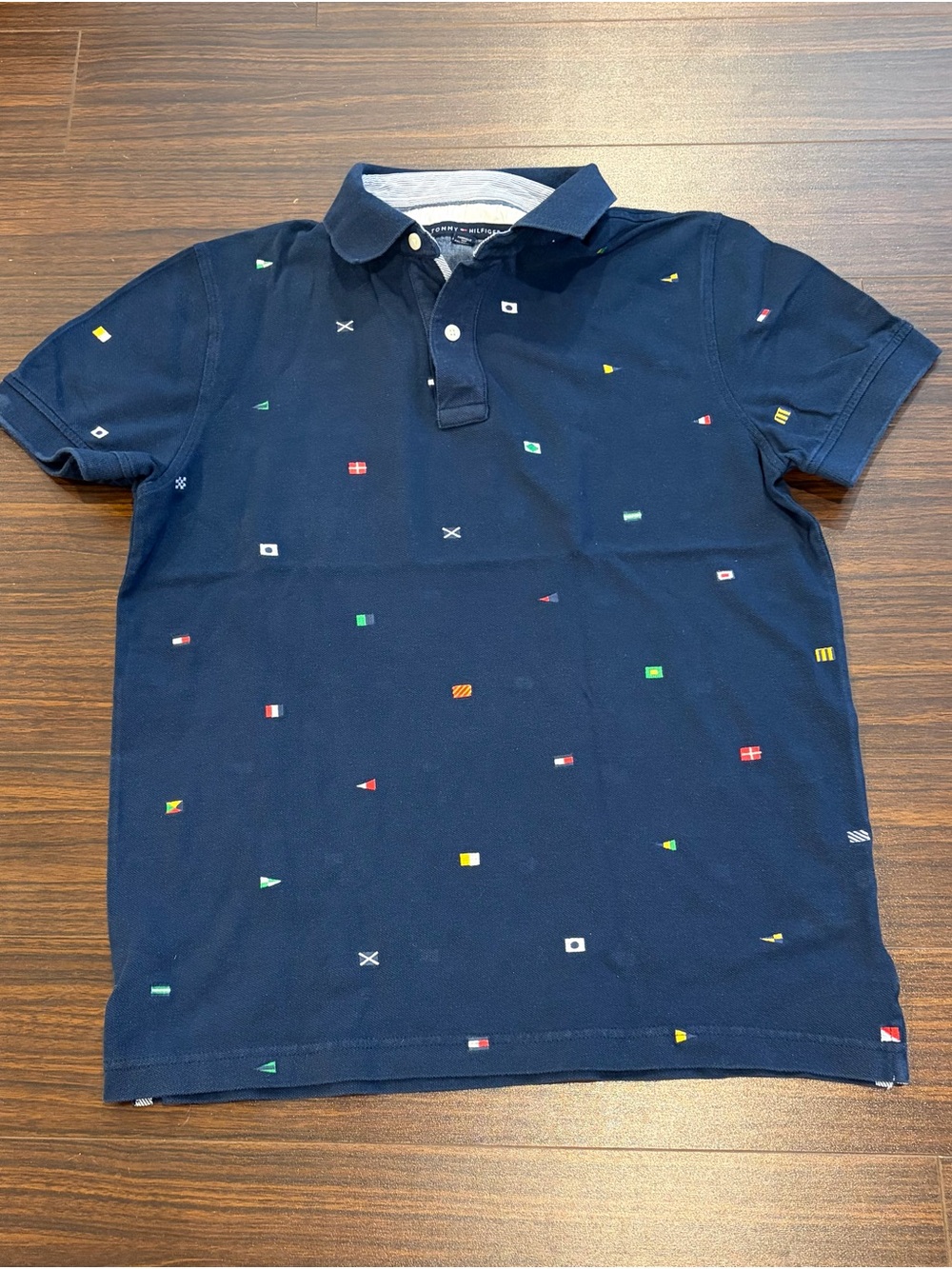 Tommy Hilfiger Navy Polo with Multicolor Nautical Flag Embroidery